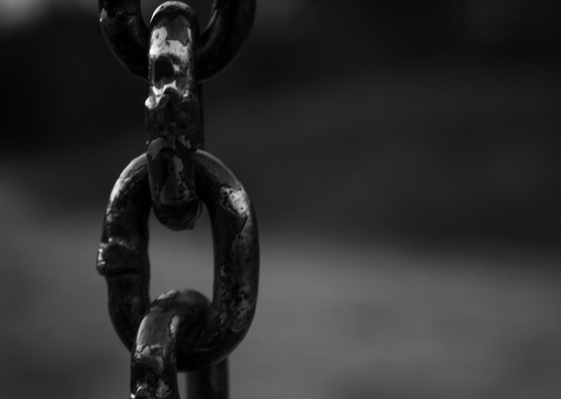 Dark picture of a heavy metal chain link
